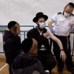 Israel’s Ultra-Orthodox Jews get Covid-19 vaccine but still face resentment