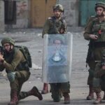 Palestinians say two officers die in West Bank clash with Israeli forces