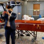 ‘So many bodies piled up’: Hong Kong funeral services overwhelmed by COVID