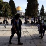 Palestinians clash with Israeli police at Jerusalem holy site, 31 injured