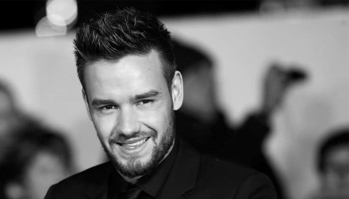 One Direction fans hold vigil for Liam Payne outside hotel where he died