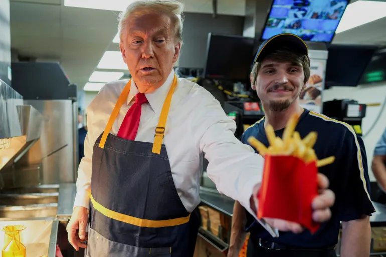 Trump flips burgers while Harris rallies churchgoers in key battleground states ahead of Election Day